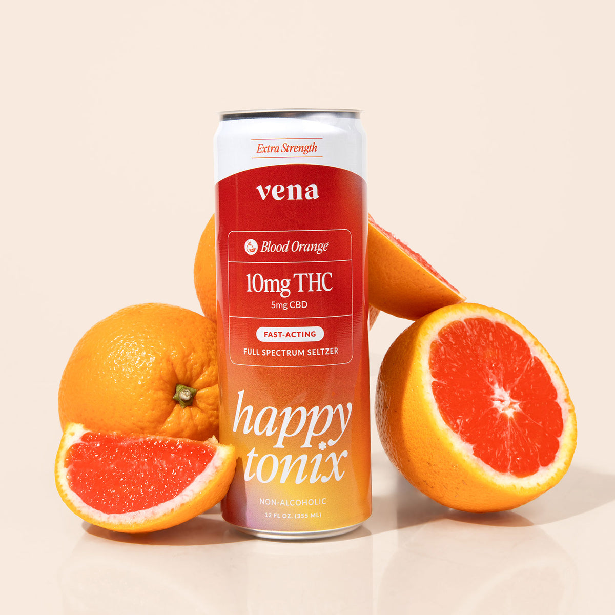 Front view of Happy Tonix Blood Orange seltzer can showing 10mg THC and 5mg CBD label with whole and halved blood oranges on pale beige background