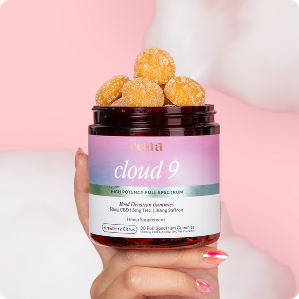 Close-up of a hand holding a Vena Cloud 9 High Potency Full Spectrum 50mg CBD | 5mg THC